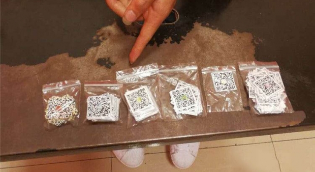两男子偷换二维码谋利 获利上万元被捕